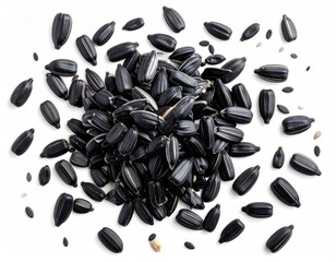 Close-up view of a scattered pile of dark, striped seeds on white