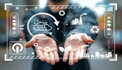 Futuristic Concept of Sustainable Development with Hands Holding Digital Interface Featuring Eco-Friendly Icons and Environmental Data Visualization