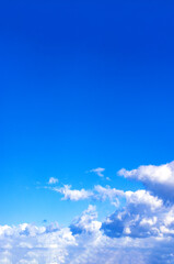 Expansive sky with layered cirrus and cumulus clouds in purplish-blue and light tones&mdash;perfect for sky-themed background use and tranquil atmospheric compositions.