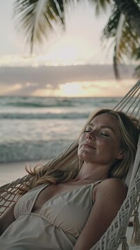 European woman savors the beauty of slow life, immersed in a digital detox by the beach. Her unplugged moments embody serenity, offering peace and harmony with nature&rsquo;s tranquil rhythms.