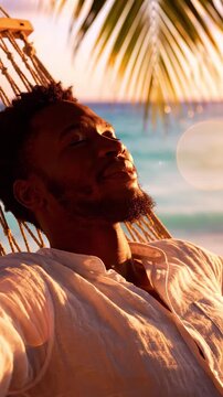 Amidst the ocean&rsquo;s song, African American man escapes to a world of unplugged serenity, embracing digital detox. Beach whispers freedom, encouraging peace and tranquility in each natural moment.