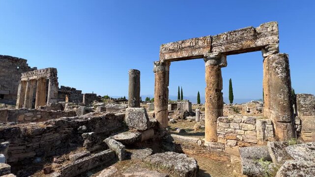 HIERAPOLIS in Denizli, TURKEY, August 13, 2024: The ancient city of Hierapolis near Pamukkale, against the backdrop of nature and mountains. The Phrygian period.UNESCO.4K