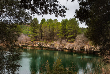 Travertine dam, natural barrier between lagoons in Lagunas de Ruidera Natural Park, Spain