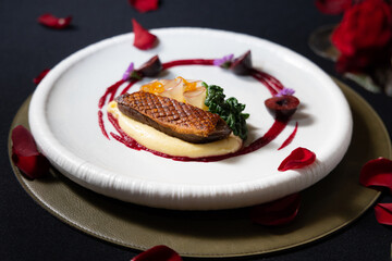 Exquisite culinary masterpiece presented on a sleek plate