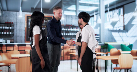 Successful Restaurant Team Seal Partnership Deal With Manager