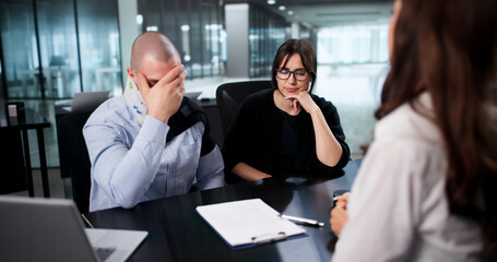 The Personal Injury Lawyer Meeting With An Unhappy Couple