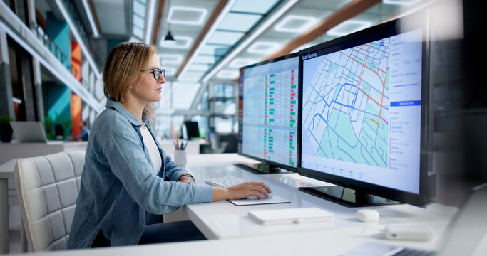 Female Logistics Coordinator Strategically Planning Efficient Routes