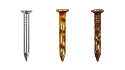 Close-up shot of three metal nails, one new and two showing signs of rust and corrosion.