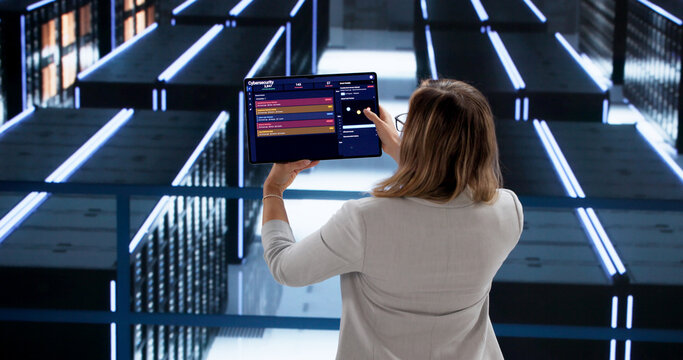 Cybersecurity Analyst Investigating Data Center Breach - Powered by Adobe