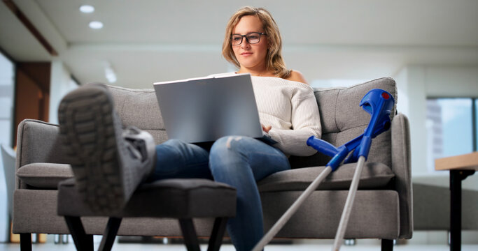 Happy Woman With Crutches
