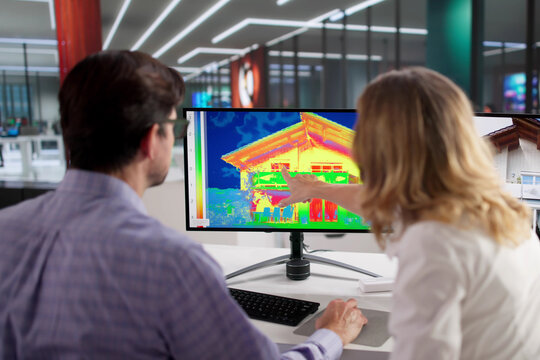 Energy Auditor Conducts Thermal Imaging Check