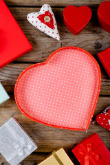 Close-up of various valentine gifts on wooden table, copy space