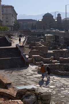 Sunny view of the Ancient Serdica archaeological complex in Sofia, revealing Roman ruins and city foundations integrated into the modern urban environment, with St Nedelya, BG, 30 Dec. 2025