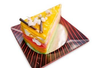 Die cut of rainbow crepe cake on white isolated.
