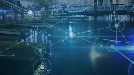 Animation of network of connections and data processing over cityscape - Powered by Adobe