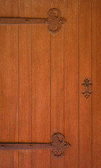 Brown old wooden door with keyhole