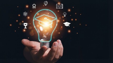 A hand holds a glowing light bulb with a neon graduation cap surrounded by educational and success icons on a dark bokeh background