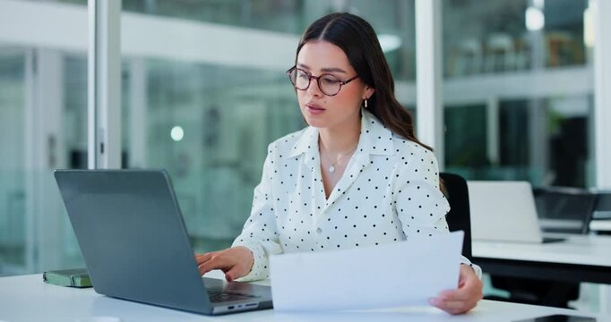 Woman, laptop and documents at office with review, administration and glasses at investment company. Person, financial advisor or consultant with paperwork, report or typing with computer at agency