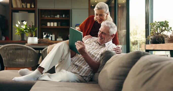 Tablet, happy and senior couple on sofa with planning for retirement vacation together in home. Conversation, digital technology and elderly people in living room with booking flight tickets in house
