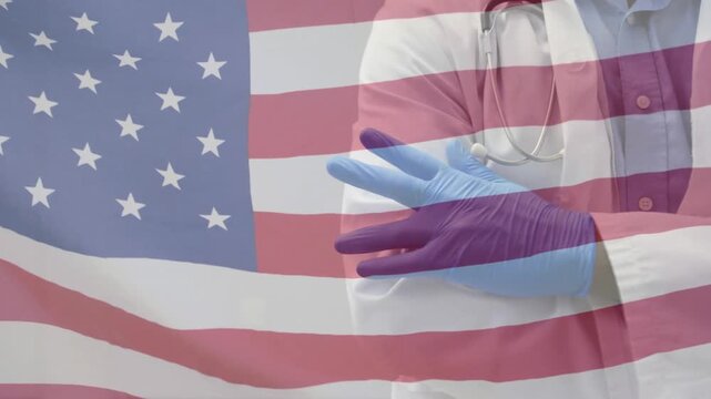 American flag waving over mid waving against mid section of waving over american flag