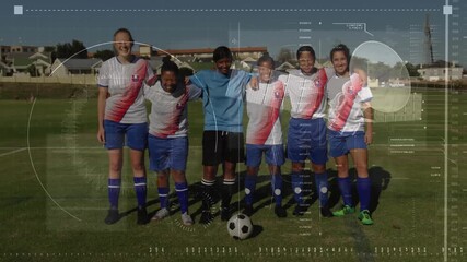 Animation of interface with data processing over team of diverse female soccer players smiling - Powered by Adobe