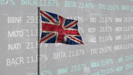 Animation of stock market data processing over waving uk flag against aerial view of cityscape - Powered by Adobe