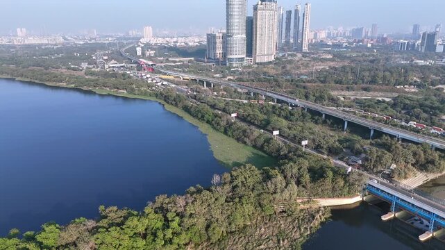 An Aerial Shot of Delhi Metro at Kalindi Kunj Bridge in Delhi, NCR, India