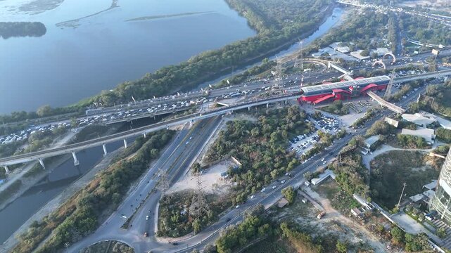 An Aerial Shot of Delhi Metro at Kalindi Kunj Bridge in Delhi, NCR, India