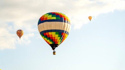 Fototapeta premium Hot air balloons in the blue sky at sunset