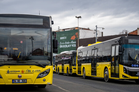 stanbul, Turkey - January 02, 2026: Yellow city buses parked at the Kadikoy bus terminal