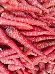 Close up shot of fresh pile of carrot.