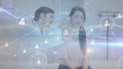 Animation of icons connected with lines over caucasian doctor checking ear of female patient