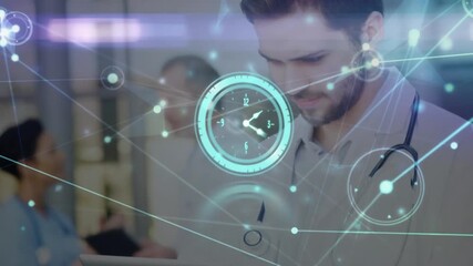 Animation of network of connections over caucasian male doctor using digital tablet at hospital - Powered by Adobe