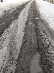 Slush ice, slurry mixture of small ice crystals, snow and liquid water. Slush forms when ice or snow melts during mixed precipitation with dirt and pollutants, resulting in gray or muddy brown color.