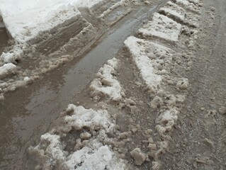Slush ice, slurry mixture of small ice crystals, snow and liquid water. Slush forms when ice or snow melts during mixed precipitation with dirt and pollutants, resulting in gray or muddy brown color.