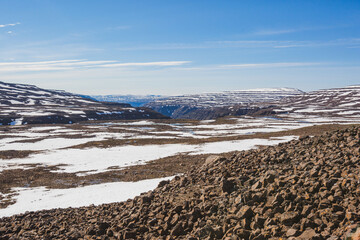 Rocks and snow on the Putorana Plateau. Taimyr. Russia