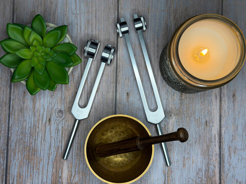 Mindfulness and Meditation Self Care Flat Lay With Candle, Tuning Fork, and Succulent Plant
