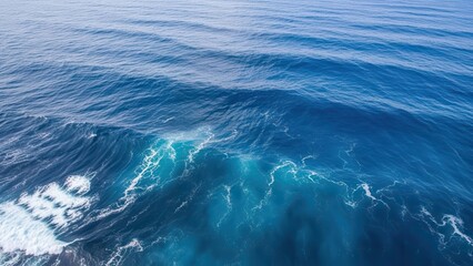 Vast and serene ocean under a clear blue sky