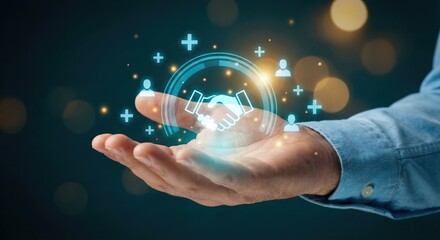 Positive adult man in blue shirt indoors holding glowing digital hologram of a handshake for business partnership and customer relationship management concept.