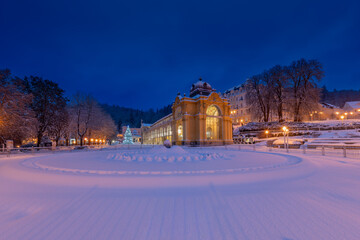 Main colonnade and singing fountain in winter with snow, morning photography - spa town Marianske Lazne (Marienbad) - Czech Republic