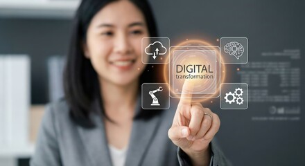 Smiling Asian adult woman professional in a grey blazer indoors at an office touching a glowing digital transformation interface with icons for AI and industry 4.0, representing technology.