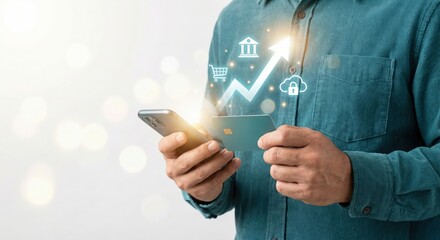 Adult South Asian man indoors holding a credit card and smartphone with glowing digital icons and a rising growth arrow, representing online banking and financial success, generated by AI.