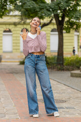 Phone call good news, gossip. Happy young woman in pleasant conversation on smartphone enjoying...