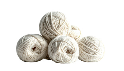 Five white yarn balls piled up on a dark background