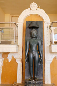 A Jain tirthankara lord Adinatha, Mahavira, Parshwanath, idol, statue, sculpture, spirituality, religion, Jainism, at a pilgrimage center in Karnataka, India.