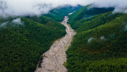 View from above. Mining of loose gold. A river destroyed by gold miners. A developed field in the...