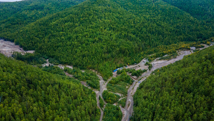 View from above. Mining of loose gold. A river destroyed by gold miners. A developed field in the...