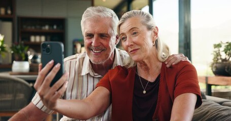 Old couple, wave and phone for video call at house with discussion, friendly chat and bonding. Smile, elderly people and greeting with mobile for online conversation, contact and funny joke in lounge