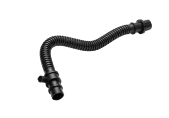 A black plastic automotive crankcase breather hose with corrugated pipe isolated on a white studio background with copy space. Concept of car spare parts.