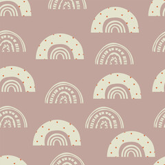 Seamless vector pattern with hand-drawn rainbows and hearts. Trendy children's texture for fabric textile wallpaper.